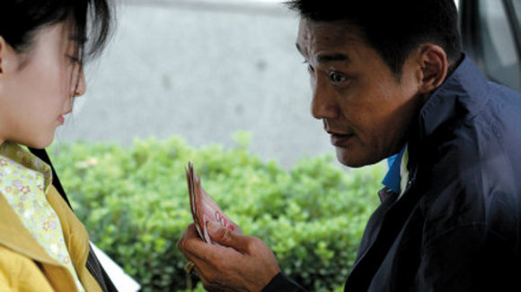 Photo from the movie Lost in Beijing [2007]