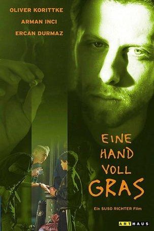 L'affiche du film Pour une poignée d'herbe